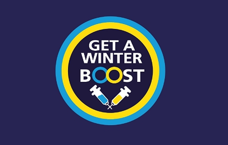 Get a Winter Boost logo. This is an example of visual management and nudge theory - Newcastle Hospitals computer desktop background encouraging staff to get their COVID-19 and flu vaccinations