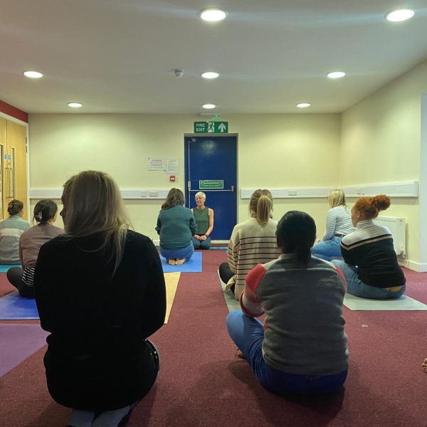 Staff taking part in yoga